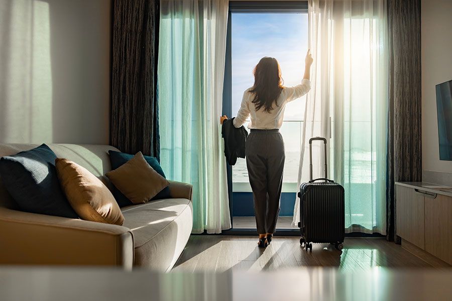 Business woman in a hotel room