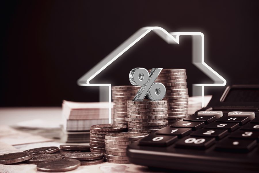 Cash and mortgage with house model