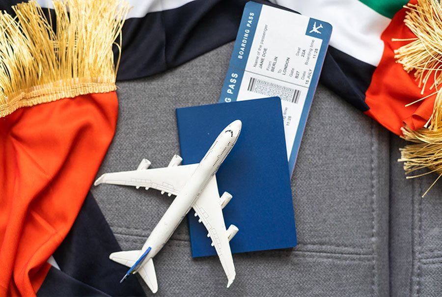 Plane Boarding Pass UAE Flag showing Visa Free Travel.