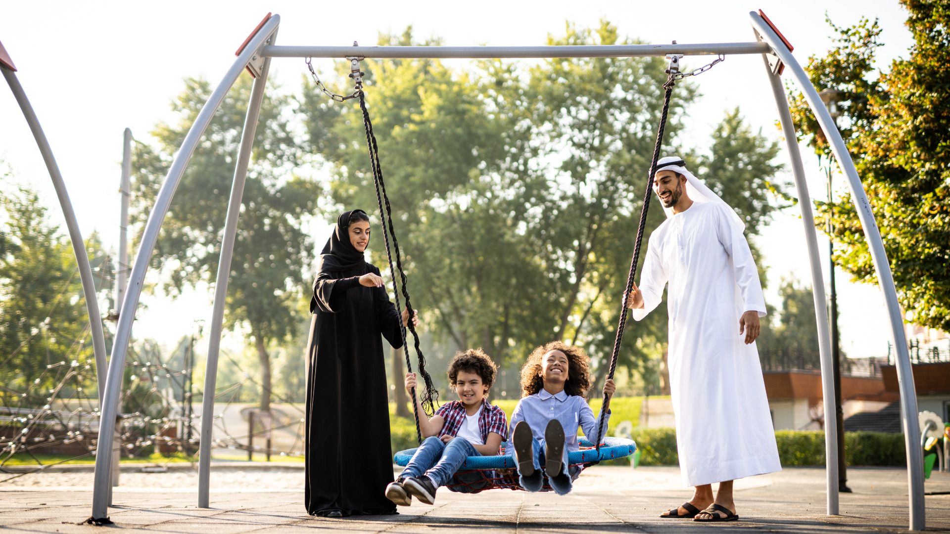 cinematic-image-of-a-family-playing-at-the-playground.jpg